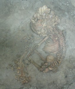 One-year-old skeleton excavated in block, now curated in the Konya Archaeology Museum.