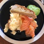 Scrambled eggs with avocado and smoked salmon
