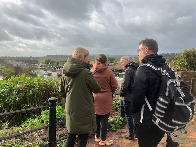 The HAIRE teams from East Sussex and Belgium are looking over a vista of housing and fields near Rye