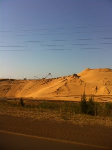 Mine-dredging of sand dunes at Richards Bay in KwaZulu-Natal Province for ilmenite, rutile and zircon. 